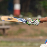 Sailor playing cricket.