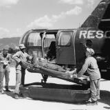 The 3rd Air Rescue Squadron flew Sikorsky H-5s equipped with two pods on either side of the fuselage. Each pod could transport a casualty strapped to a stretcher.