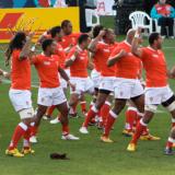 A Tonga rugby team performing the Sipi Tau before a match.