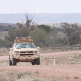 A US Jeep leads two US Raptors during a Trusted Operation of Robotic Vehicles in a Contested Environment (TORVICE) trial.