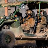 United States Marines arrive in a Tactical Dune Buggy to the main battle position during Exercise Brolga Run.