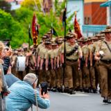 Australian Army soldiers of the 12th/16th Hunter River Lancers march through city streets of Armidale, New South Wales during the Freedom of Entry parade.