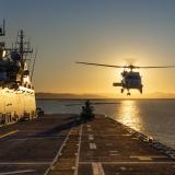 Chopper landing on ship