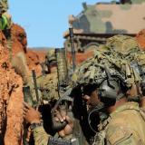 Australian Army soldiers prepare to clear a trench system.