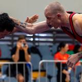 Australian Army Major Ben Gooley (in red) competing in freestyle wrestling at the 2023 Senior National Championships at the Lang Park PCYC, Brisbane.