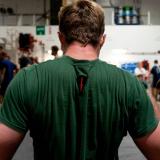 A British Royal Marine Commando participates in a fitness challenge against Australian Army soldiers.