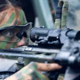 Australian Army soldier ready to sight down their rifle.