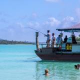 Fishing and swimming from a boat in the Cook Islands