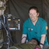 Combat medics treat a simulated casualty.