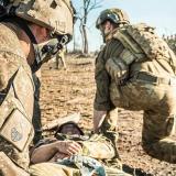 Medics attend to a soldier