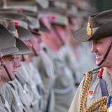 Forces Commander and parade reviewing officer, Major General Chris Field AM, CSC, inspects Australian soldiers.