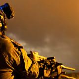 A soldier using night vision.