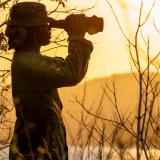 An Australian Army soldier from North-West Mobile Force uses a spotting scope to conduct surveillance of the northern Kimberley region of Western Australia in October 2024.