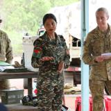 A Lieutenant from the Timor Leste Defence Force translates range instructions from an Australian Army Lieutenant ahead of a live-fire range shoot.