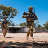 Australian Army soldiers move to cover during a clearance of Line Creek Junction during an exercise.