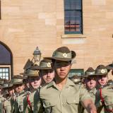 New Army Reserve part-time officers march to commence their graduation ceremony.