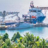 ADV Reliant alongside Funafuti during a port visit to Tuvalu, sharing the wharf with HMTSS Te Mataili III.