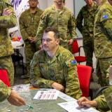 Australian Army personnel brief Major General Richard Vagg during a bilateral war game with members of the Japan Ground Self-Defense Force.