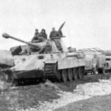 An early Panther towing an immobile tank.