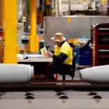 Thales Australia employee examining munitions – partway through the manufacturing process at the Benalla, VIC production line.