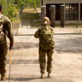 Recipients of the Jonathan Church Good Soldiering Award from the Australian Army approach the Sandakan Death March Memorial in Sabah, Malaysia, while retracing the historic route.