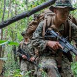 United States Marine Lance Corporal Kevin Martinson from Marine Rotational Force – Darwin patrols through the Combat Training Centre - Jungle Training Wing, Tully, Queensland.