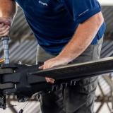 A United States Defence contractor from Sikorsky conducts maintenance on a UH-60M Black Hawk helicopter at Royal Australian Air Force Base Richmond on 25 March 2024.