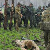 Soldiers take a prisoner during an exercise.