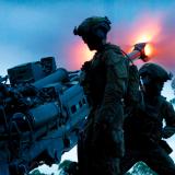 Australian Army gunners from 4th Regiment, Royal Australian Artillery, fire a M777 howitzer during Exercise Brolga Walk in Townsville field training area, Queensland.