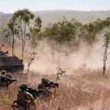 Australian Army soldiers conduct a dismounted assault during a Heavy Armoured Capability System live fire serial.