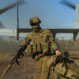An Australian soldier arrives at Mount Bundey Training Area after travelling on a United States Marine Corps MV-22B Ospreys.