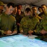 An Australian Army Commander briefs during the Rehearsal of Concept drill for brigade live fire activity.