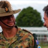 The Honourable Robert Hill, Minister for Defence is greeted by Military Adviser to Special Coordinator, RAMSI Colonel Michael Krause at Honiara International Airport.