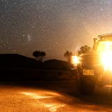 An Australian Army G-Wagon underneath the Milky Way in the southern hemisphere night sky.